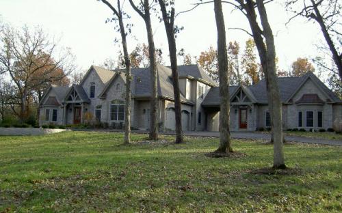 This 9,000 Sq. Ft. Custom home in Bull Valley was built on 5 acres